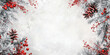 © julijadmi - Christmas background with snow-covered pine branches, red berries, and free space in the center for text or design.
