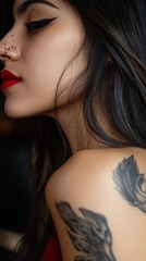 Wall Mural - Portrait of a Woman with Long Black Hair and Tattoos