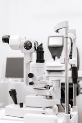 Close-up of a laser for vision diagnostics and correction against a white background in an ophthalmologist's office. Modern equipment highlighting the importance of quality eye care.