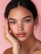 © MUdaylah - Stunning Latina woman with radiant skin and soft makeup gently touches her cheek in this close-up portrait against a pink background. Perfect for skincare ads, beauty photography, with generative ai