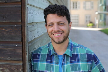 natural man wearing a plaid shirt