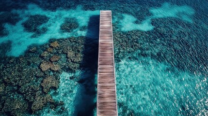 Wall Mural -   An aerial shot of a pier surrounded by blue water and rocky scenery in the backdrop