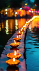 A line of diyas glowing brightly on the edge of a temple pond, with colorful lights reflecting on the water and the temple in the background. Copy space, Indian traditional festival happy Diwali 