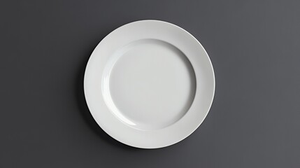 Poster - White oval plate on gray background.