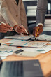 © MrAshi - Meeting to analyze and discuss the financial report situation in the meeting room, investment consultants, financial consultants closely in a vertical manner