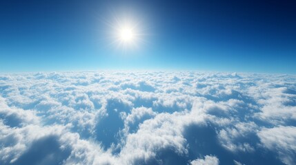 a bright skyscape above scattered clouds, deep blue with a tiny bright sun