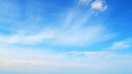 Wall Mural - Sky with light and airy cumulus clouds. Abstract blue background with summer sky.