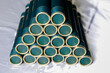 © sidneydealmeida - green velvet cardboard tubes stacked related to school graduation