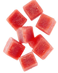 Wall Mural - Colorful watermelon cubes isolated on white background creating a refreshing composition