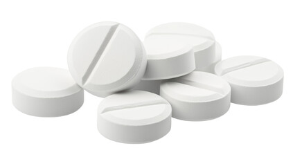 A collection of white pills isolated on a bright surface showcasing their uniform design