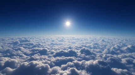 Wall Mural - above the clouds, with a deep blue sky