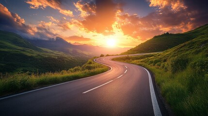 Aufkleber - A winding road with a beautiful sunset in the background
