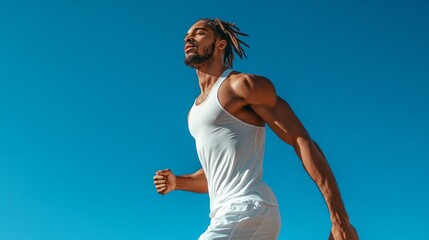 Poster - A man is running in the blue sky wearing a white tank top and white shorts