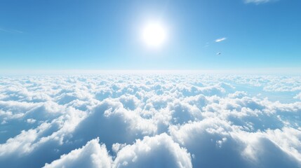 a bright skyscape above scattered clouds, with a vivid blue sky and a tiny bright sun