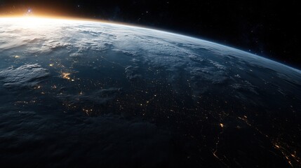 Wall Mural - a view of earth surface showing the transition between day and night, with city lights appearing on 