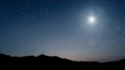 Wall Mural - night christmas panorama with a star in the sky