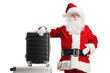 © Ljupco Smokovski - Santa claus with suitcases traveling