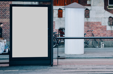 Wall Mural - Public transport station billboard with blank copy space screen for advertising text message,promotional content, empty mock up Lightbox for information, stop clear poster display in urban city street