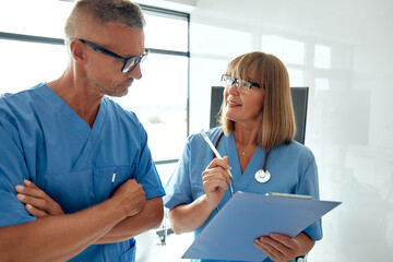 Wall Mural - Medical Professionals Working Together to Improve Patient Care and Outcomes Effectively