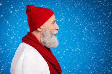 Canvas Print - Profile portrait of satisfied friendly aged man look empty space smile isolated on blue color background