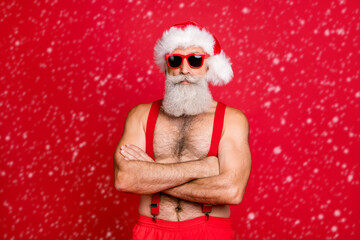 Poster - Portrait of his he nice attractive content calm gray-haired strong hot muscular macho St Nicholas folded arms festal costume isolated over bright vivid shine red background