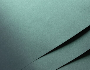 Aufkleber - Paper with a rich texture and a minimalist, monochrome background featuring a luxurious gradient of teal, turquoise, aqua, and mint. The layered folds and geometric lines create an