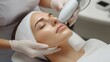 © k_viktar - Facial treatment with device, woman receiving skincare procedure