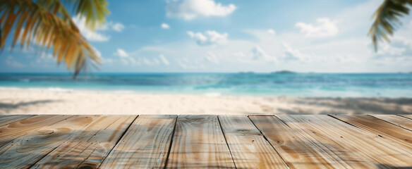 Wooden floor or plank on tropical beach in summer. For product display. Calm sea, white beach, palm leaves and blue sky background.