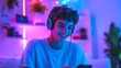 © Watermill Studio - Happy gamer wear headphone competition play video game online with smartphone colorful neon light in living room at night modern house. Esport streaming game online, Home quarantine activity