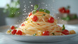 © Irina - Freshly prepared spaghetti with cherry tomatoes and herbs splashed with water droplets on a white plate