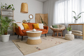 Poster - Interior of living room with mirror, red sofa and plants