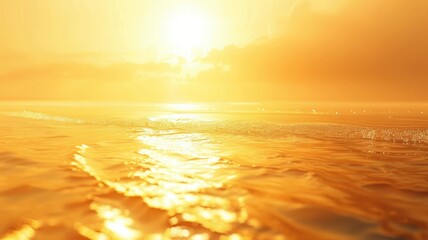 Wall Mural - golden sunset over shimmering ocean waves under glowing sky