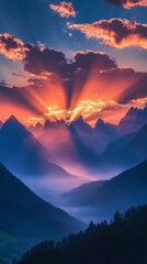 Wall Mural - Sunset over misty mountains with vibrant sky