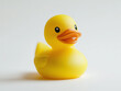 © Shanorsila - A bright yellow rubber duck with a playful expression, against a white backdrop.