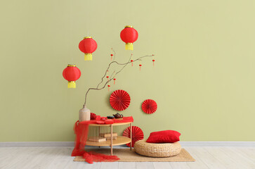 Canvas Print - Interior of room with table, pouf and decor for Chinese New Year celebration