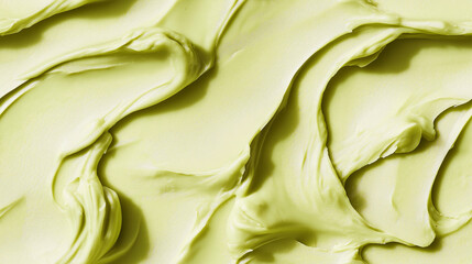 Wall Mural - a close-up, top-down view of pistachio butter spread across the frame, filling the image with its soft green hue and creamy, smooth texture