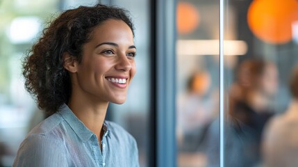 Sticker - Smiling Woman by Window in Bright Office Setting