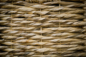 Basket weave of sustainable material woven to make a textured background pattern