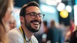 © Business Pics - Close up picture of a happy and laughing staff or participant people group listening to a startup business owner at a trade show exhibition event. Generative AI.