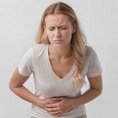 Frustrated Woman with Hand on Stomach Showing Discomfort or Stomach Pain