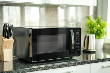 A stylish cooking space features a contemporary heating appliance amidst an array of culinary tools, highlighting efficiency and convenience.