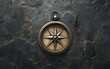 © Matthew - A vintage compass pendant resting on a textured stone surface, symbolizing navigation and exploration.
