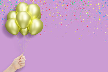 Aufkleber - Female hand holding bunch of shiny golden or yellow balloons on violet background with confetti. Empty space for text