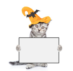 Aufkleber - Kitten wearing hat for halloween holding blank white banner. isolated on white background