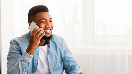 Poster - Happy office worker received good news on phone, he got promoted, panorama with copy space