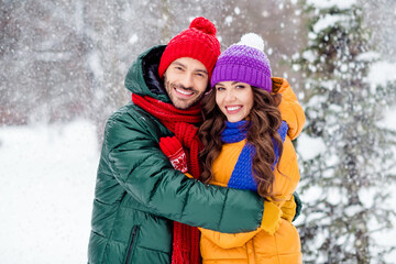 Canvas Print - Photo of attractive sweet girlfriend boyfriend dressed vests smiling cuddling enjoying walking snow outdoors forest