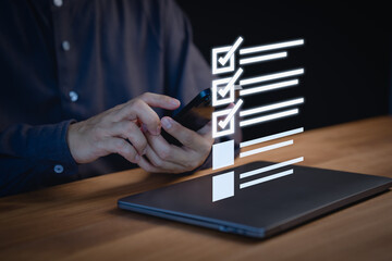 Fototapete - Person using a smartphone to check items off a digital checklist, productivity, and organization. Concept emphasizes the use of technology for staying organized and completing tasks efficiently.