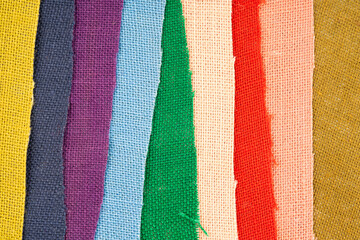 Bright collection of colorful velour textile samples.