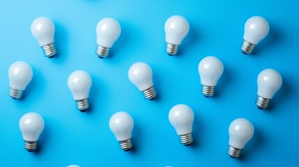 Array of White Lightbulbs on Vibrant Blue Background