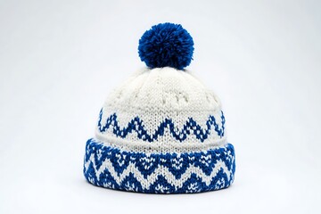 knitted blue white hat isolated on white background.hat with pompon.